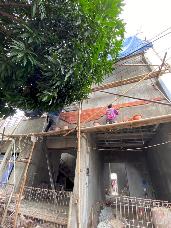 pemasangan bata tempel pada dinding eksterior